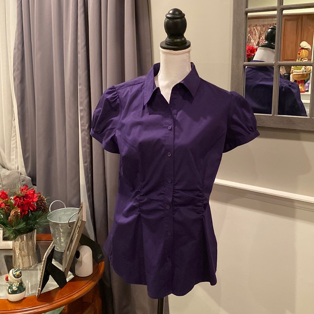 The limited purple short sleeve blouse